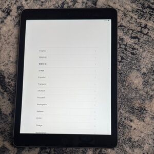 Apple iPad 6th Generation  32 GB  9.7 in - Space Gray
etched on back see pics